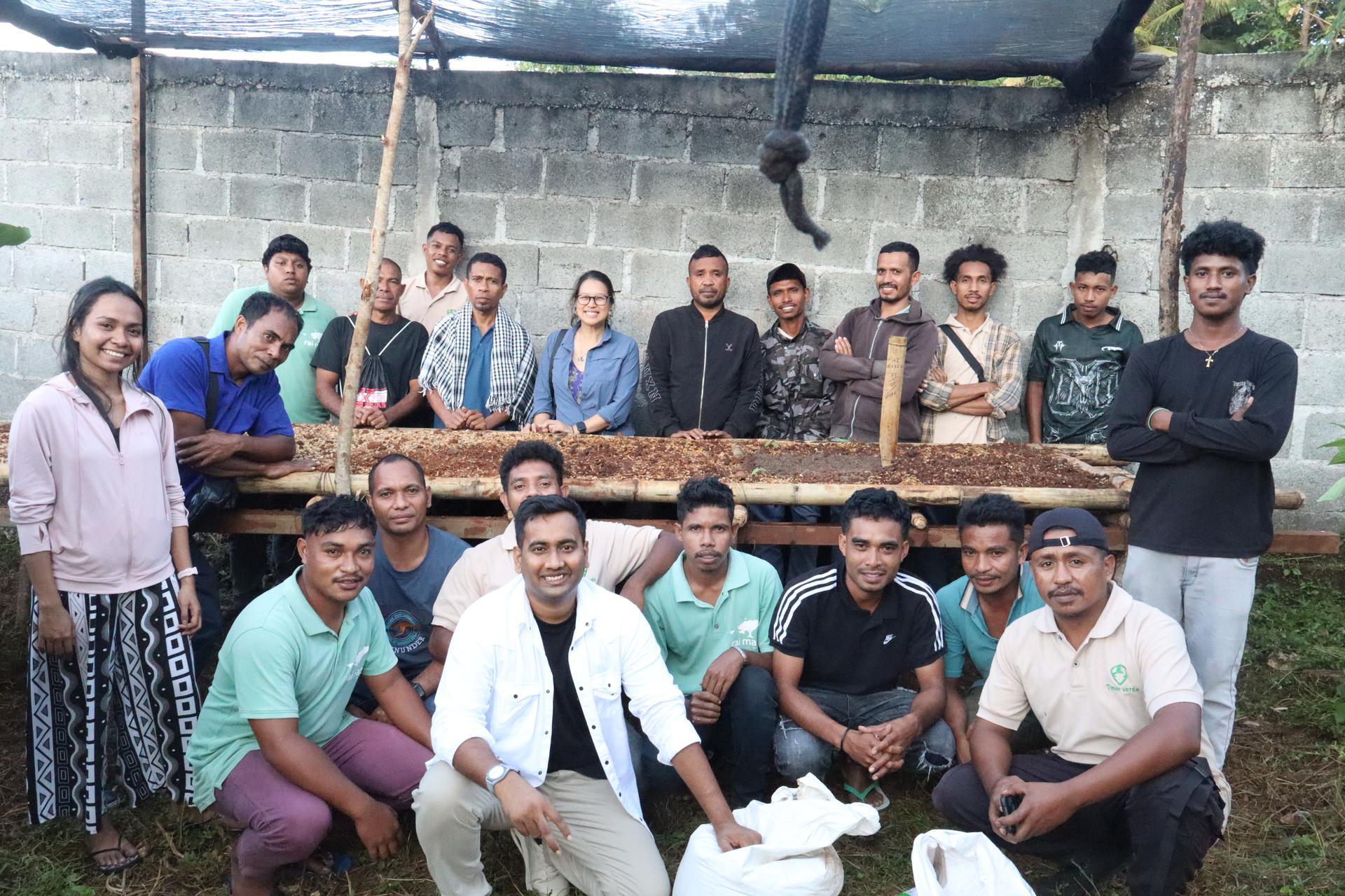Manir Dhabak with a field team during seedbed work